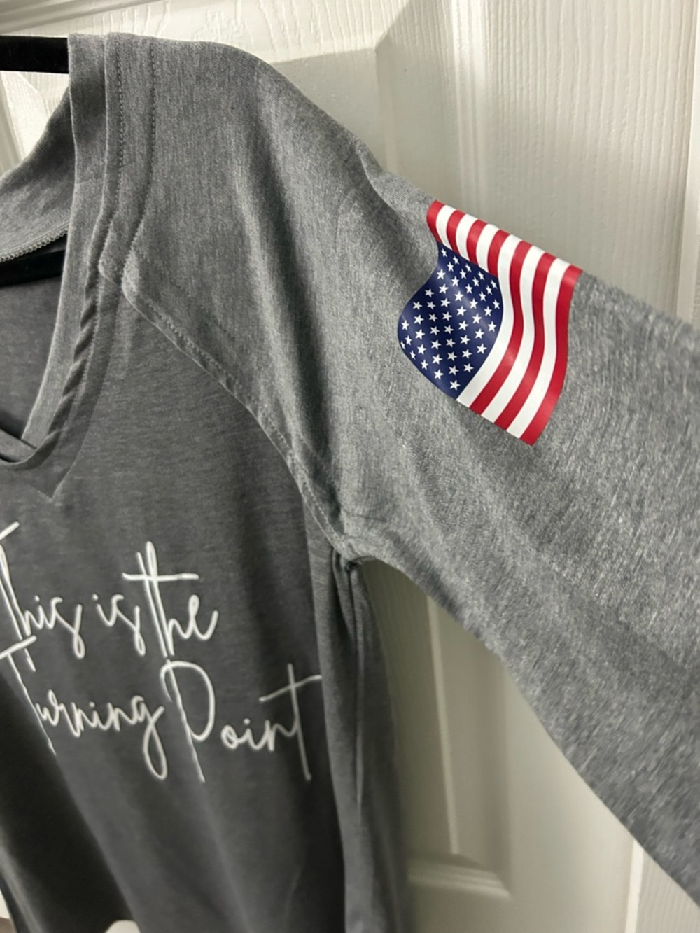 Gray Long-Sleeve Top with American Flag Detail the turning point size small S